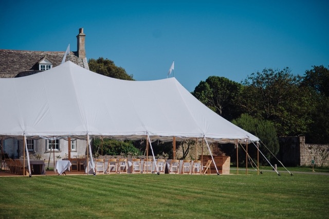 Marquee in high summer with Smedmore House behind