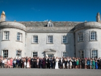 Group photo outside front of Smedmore House